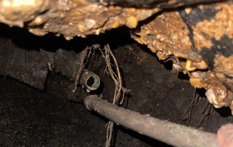 A plumbing pipe separated under the slab of a home, causing a slab leak.